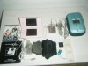 Nintendo DS Lite Rosa, con múltiples accesorios (funda, cargadores guitarra...) 