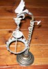 ANTIGUO  ARTILUGIO/CANDELABRO CON UN DRAGÓN 