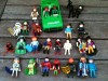 23 Playmobil Figuren mit Zubehör und 1 Playmobil Polizeiauto