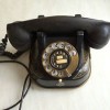 Altes schwarzes Telefon mit Wahlscheibe aus Bakelit - Marke Bell - Belgien
